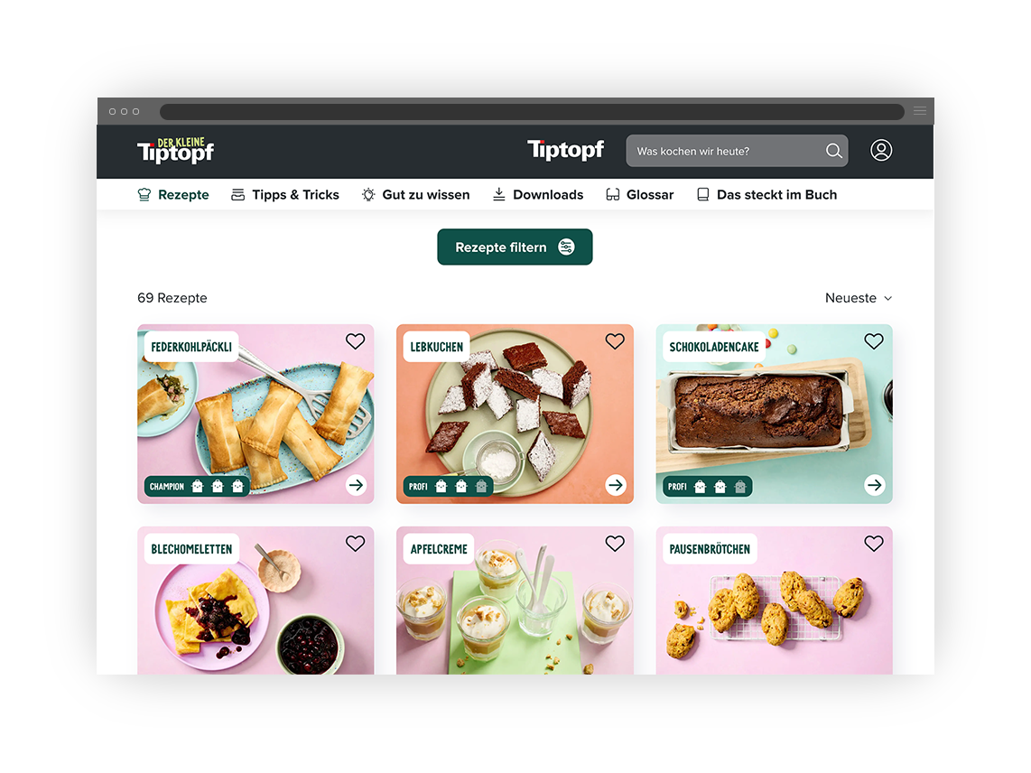 Webseite mit sechs Rezeptbildern in einem Raster, darunter Federkohlpäckli, Lebkuchen, Schokoladenkuchen, Blechomeletten, Apfelcreme und Pausenbrötchen.